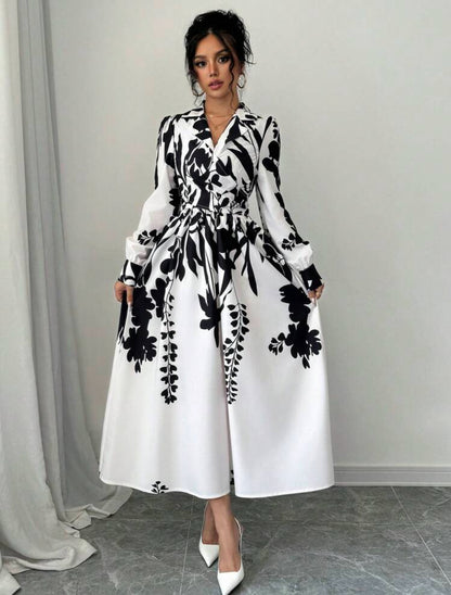 Vestido maxi elegante manga larga color beige con estampado negro