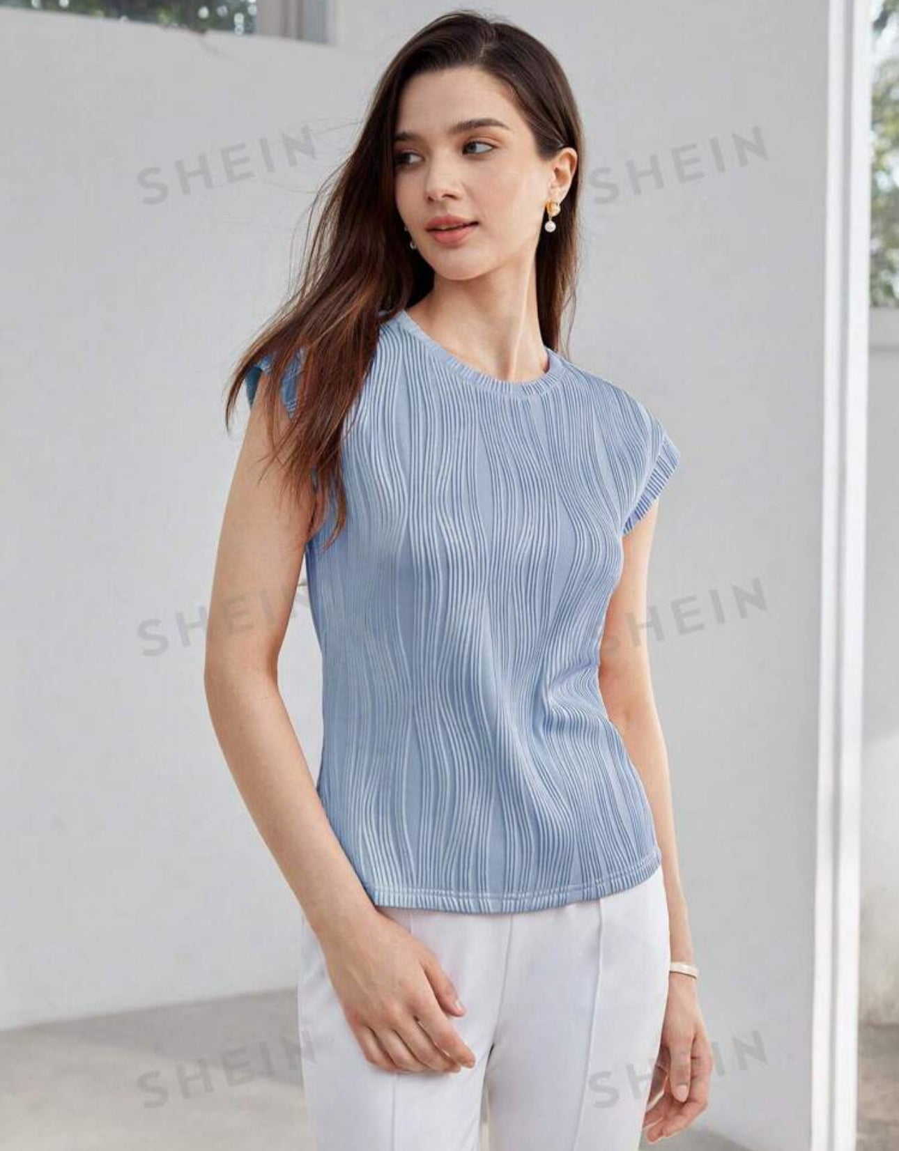 Camisa azul clara