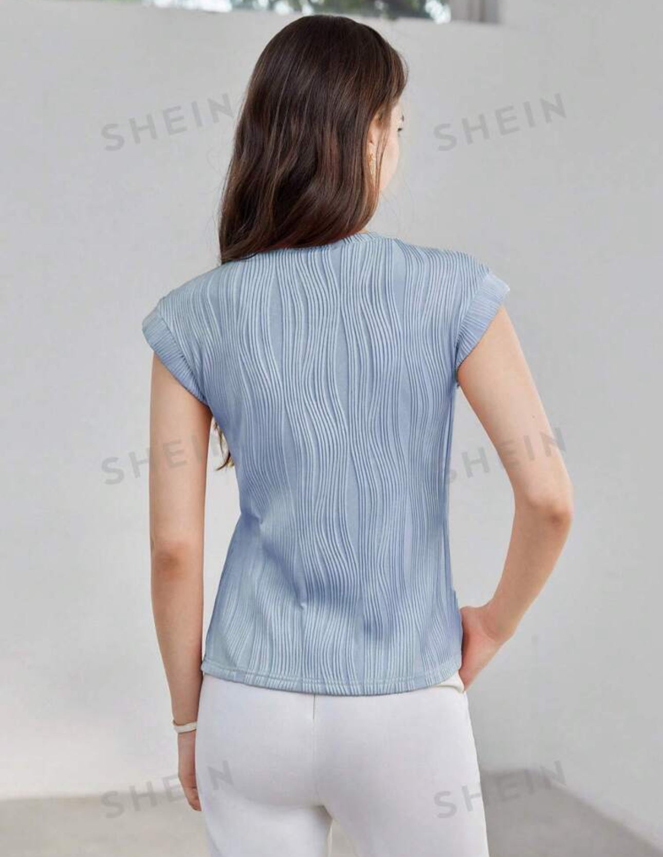 Camisa azul clara