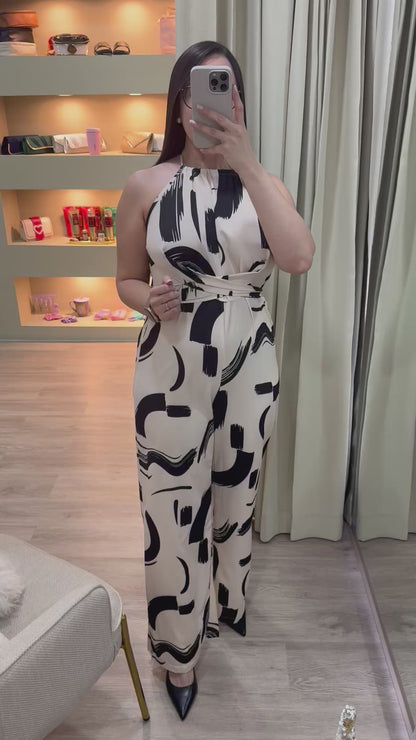 Jumpsuit beige con cinturón con estampado
