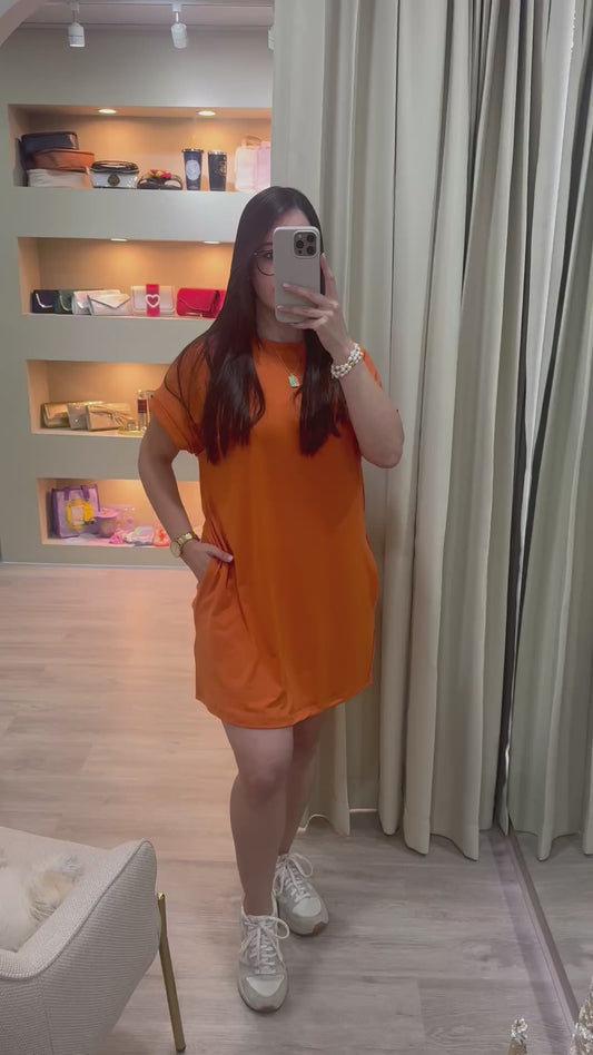 Vestido anaranjado con bosillos