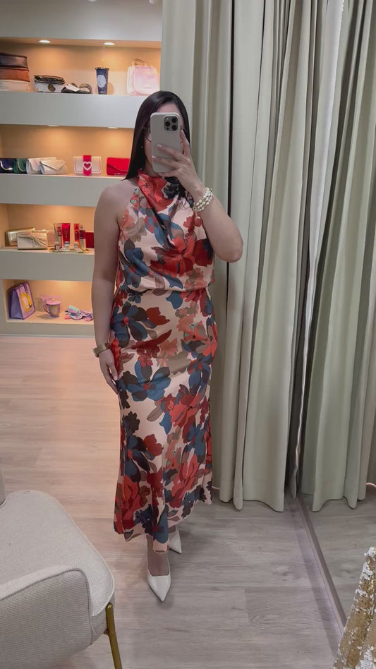 Vestido beige estilo midi con estampado floral anaranjado