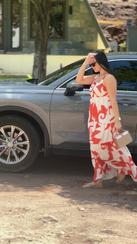 Vestido largo blanco con estampado anaranjado