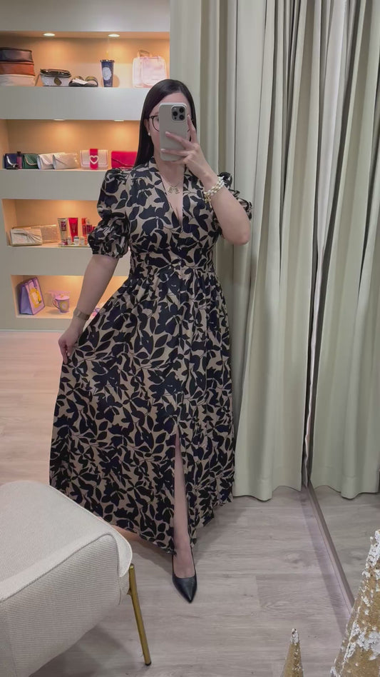 Vestido beige y negro con mangas abombadas