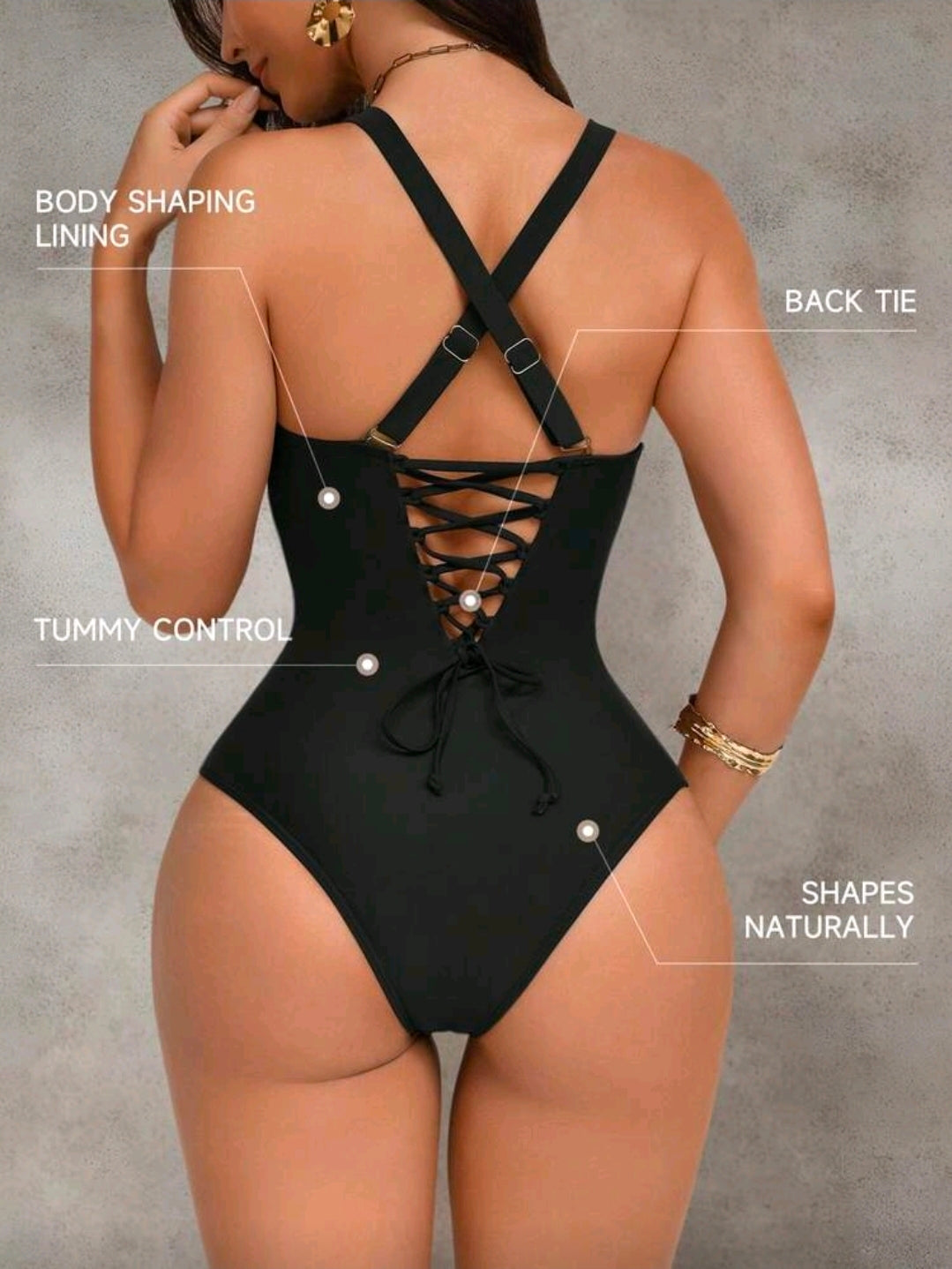 Traje de baño negro de tirantes cruzados y control de abdomen