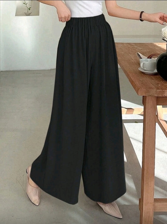Pantalon negro ancho y relajado con cintura elástica