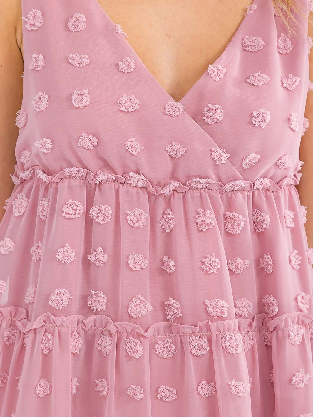 Vestido mini rosado claro con puntos en relieve