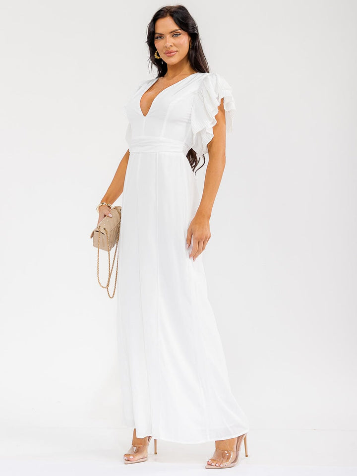 Jumpsuit blanco de pierna ancha con escote cruzado y mangas cortas con volantes