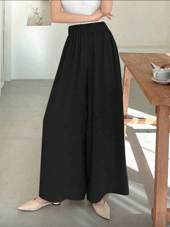 Pantalon negro ancho y relajado con cintura elástica