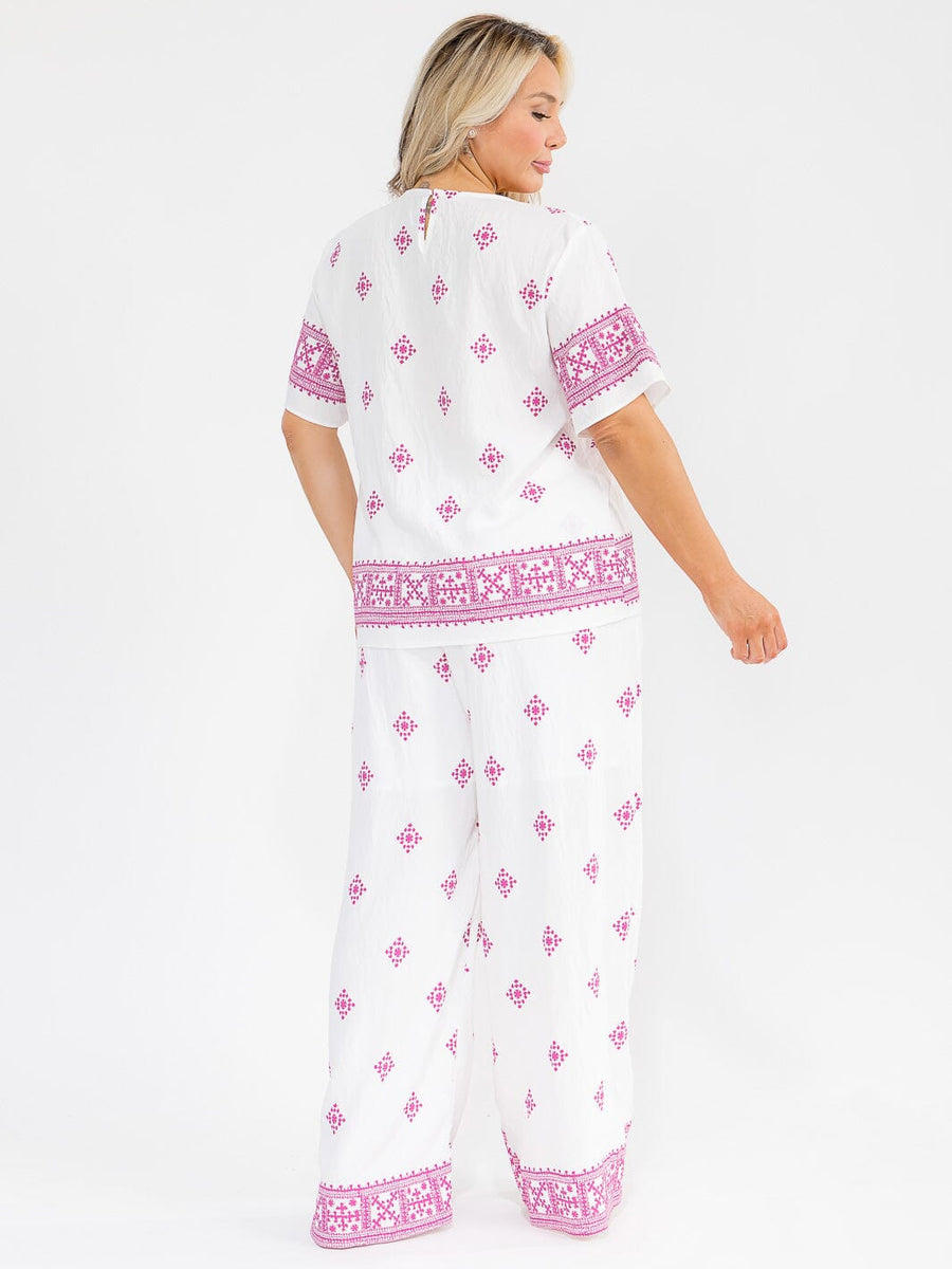 Conjunto Plus blanco y morado de blusa y pantalón con cintura elástica