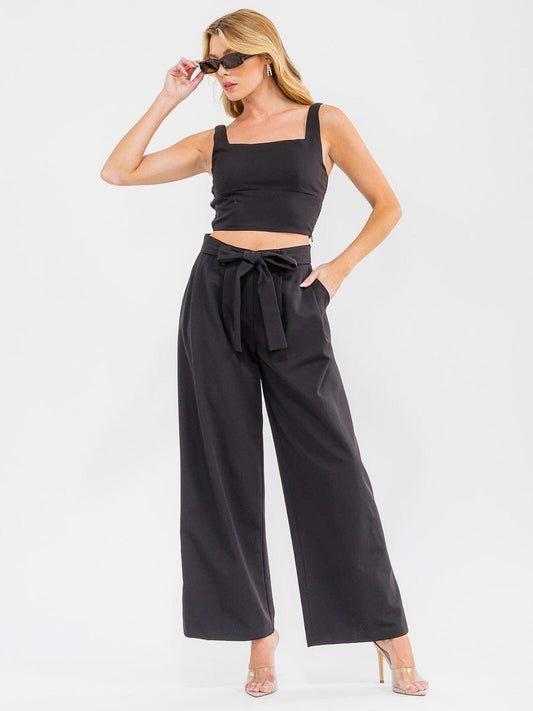 Set negro de top y pantalón con lazo