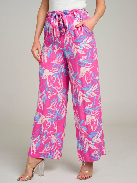 Pantalón fucsia con patron multicolor de pierna ancha