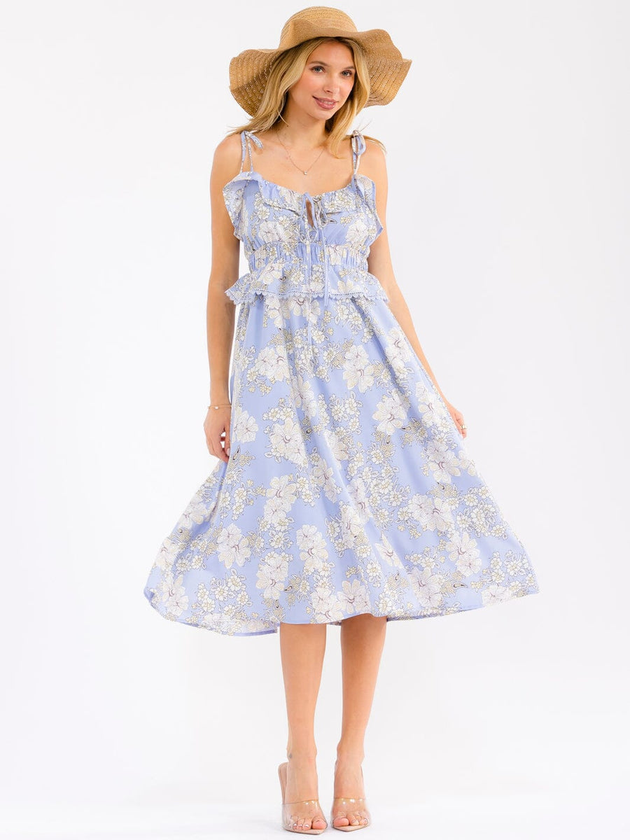 Vestido azul floral de tirantes y vuelos con cintura smock