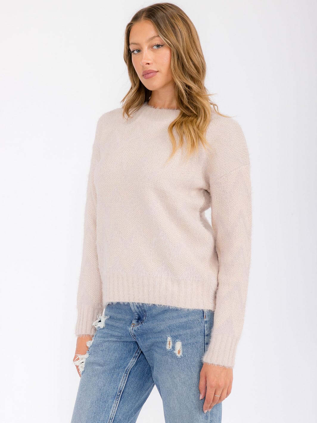 Sueter pullover blanco con detalles brillantes