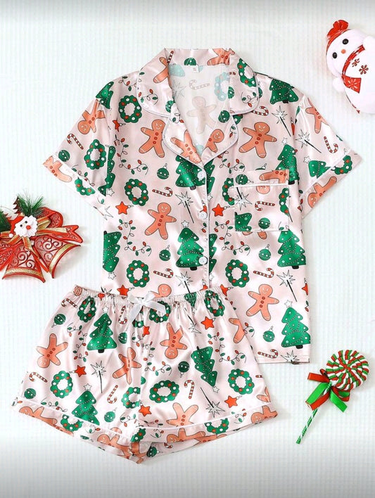 Set de Pijama Navideña Rosada de mujer con detalles verdes, rojos y blancos