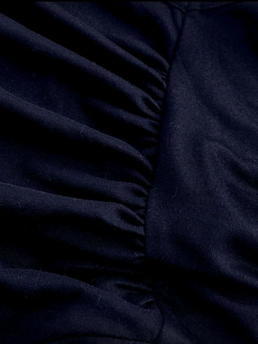 Jumpsuit azul de pierna ancha con pliegues