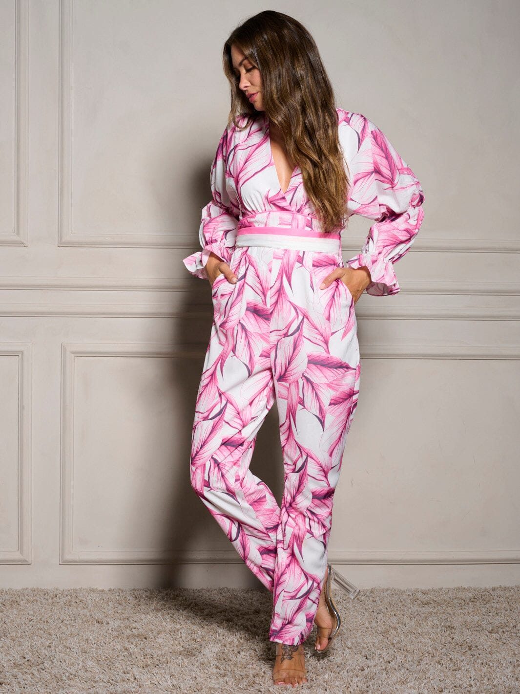 Jumpsuit fuscia y rosado manga larga y pierna ancha y con cinturon
