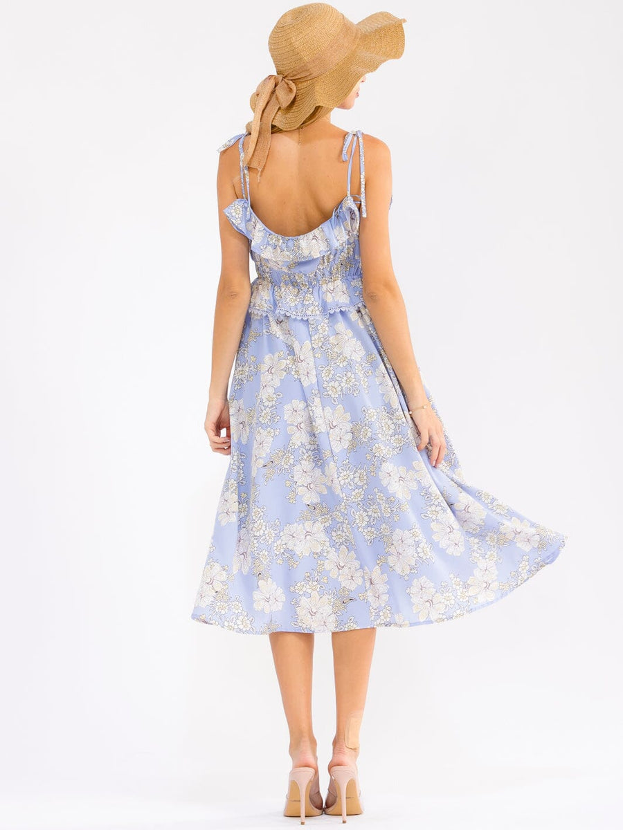 Vestido azul floral de tirantes y vuelos con cintura smock