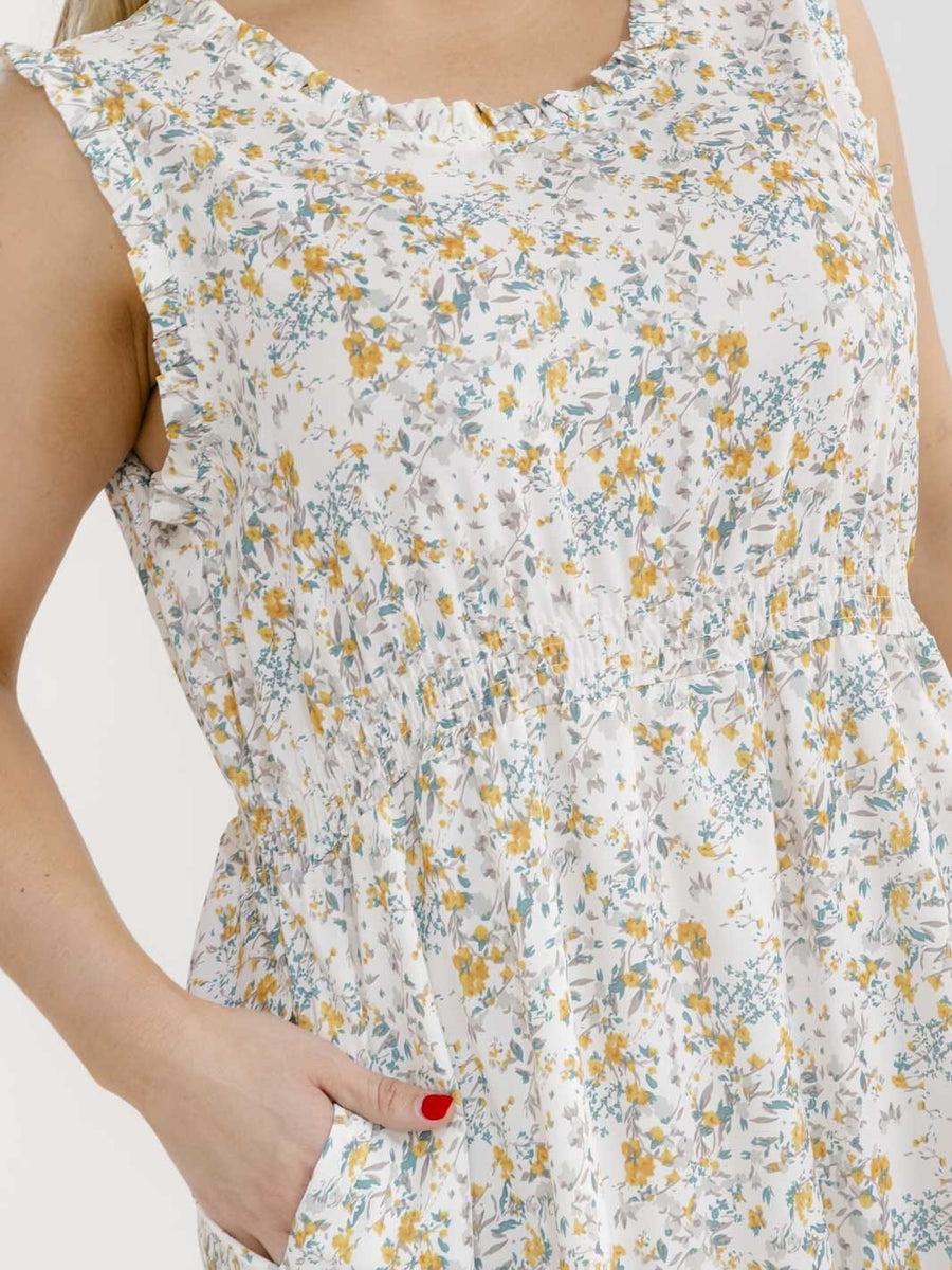 Vestido Plus blanco floral sin mangas y con bolsillos